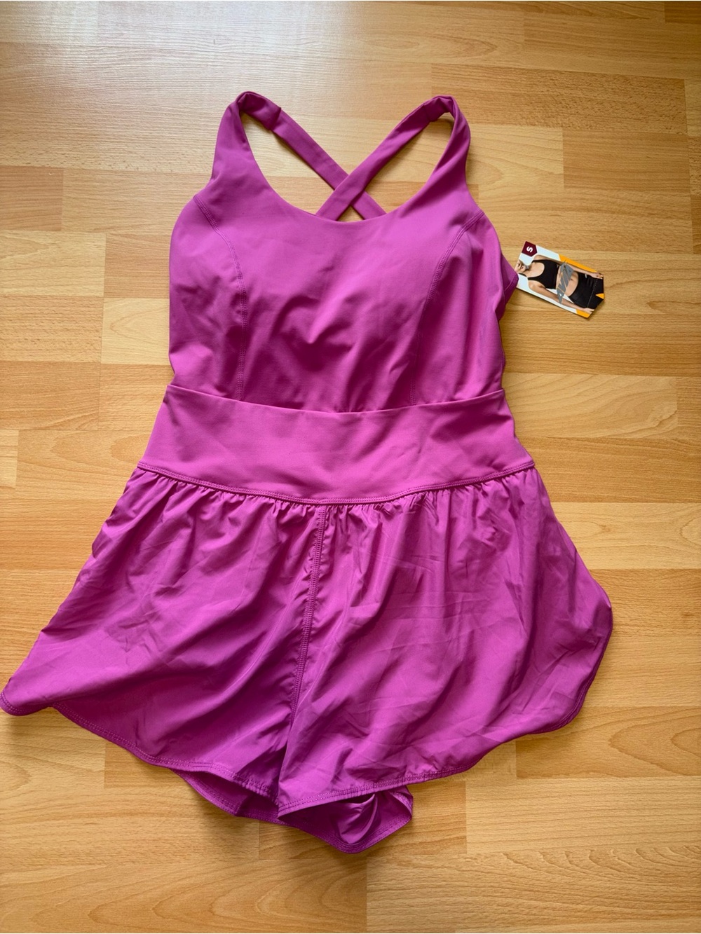 Women’s Pink Cross-Back One-Piece Athletic Romper.